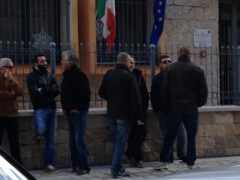 Standing, waiting, and watching.